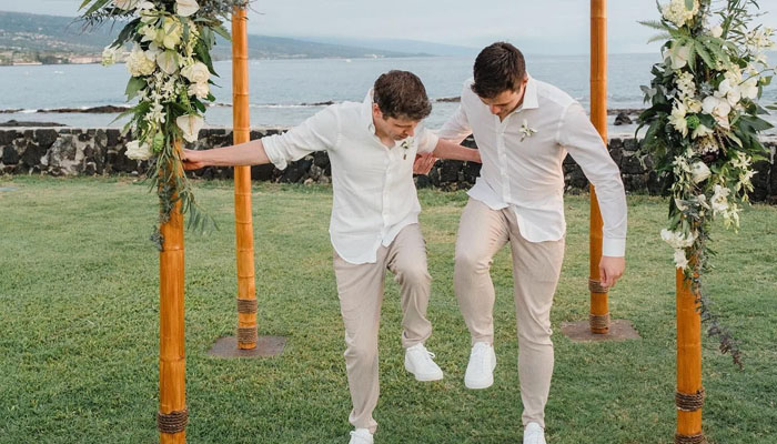 Sam Altman and Oliver Mulherin spotted during their wedding ceremony. — X/@heybarsee
