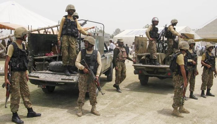 Pakistani soldiers stand guard in Bannu, Khyber-Pakhtunkhwa July 2, 2014. — Reuters