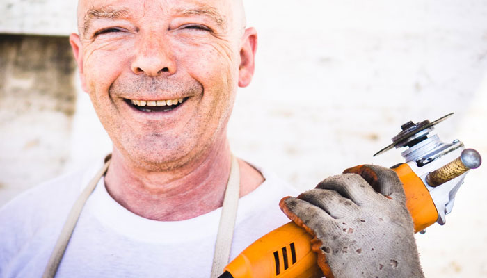 An elderly man is seen posing for the camera. — Representational image from Unsplash.