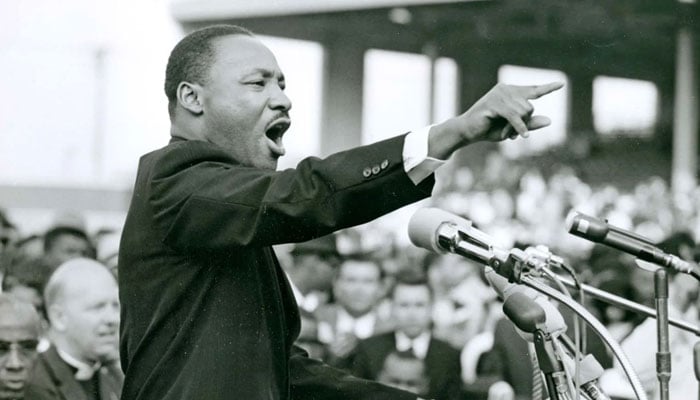 Martin Luther King Jr gave a speech in front of people. —Britannica/file