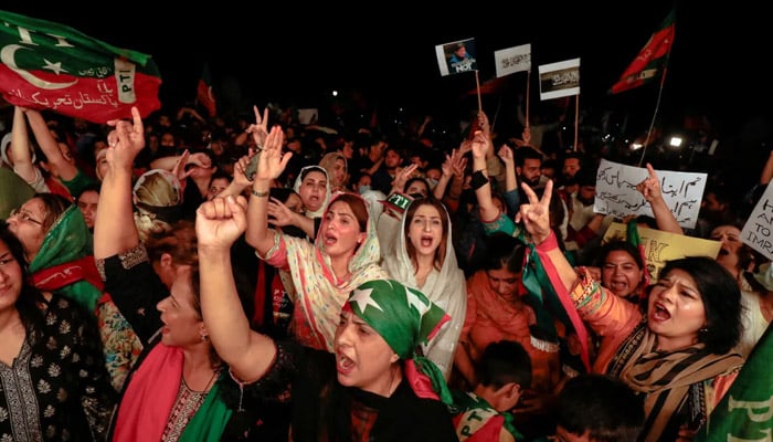 Supporters of PTI founder Imran Khan chant slogans during a rally in Islamabad. — Reuters/File