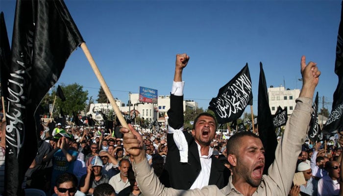 Supporters of Hizb ut-Tahrir demonstrate in Ramallah, July 7, 2012. —Issam Rimawi/Flash90