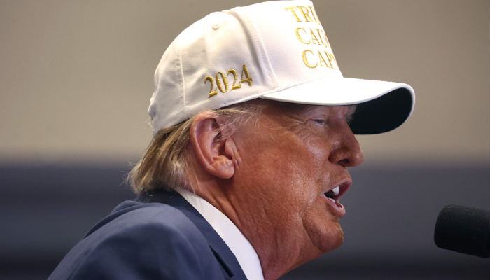 Republican presidential candidate former President Donald Trump speaks to supporters during a rally at Simpson College on January 14, 2024 in Indianola, Iowa. — AFP