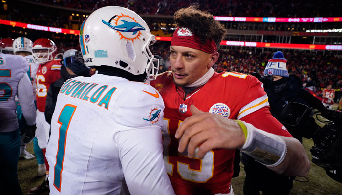 Kansas City Chiefs quarterback Patrick Mahomes (15) meets with Miami Dolphins quarterback Tua Tagovailoa (1) following the 2024 AFC wild card game at GEHA Field at Arrowhead Stadium in Kansas City, Missouri, US, on January 13, 2024. — Reuters