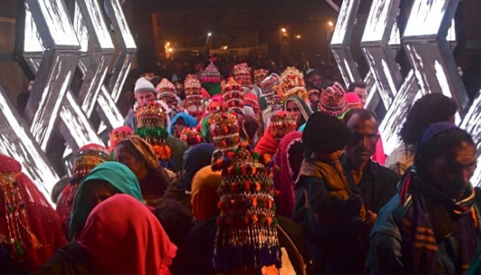 Hindu couples arrive for a mass marriage ceremony organized by Pakistan Hindu Council in Karachi on January 7, 2024. — AFP