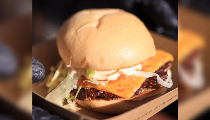 A golden shot of a scrumptious burger from Jardin. — Facebook/Karachi Eat Festival