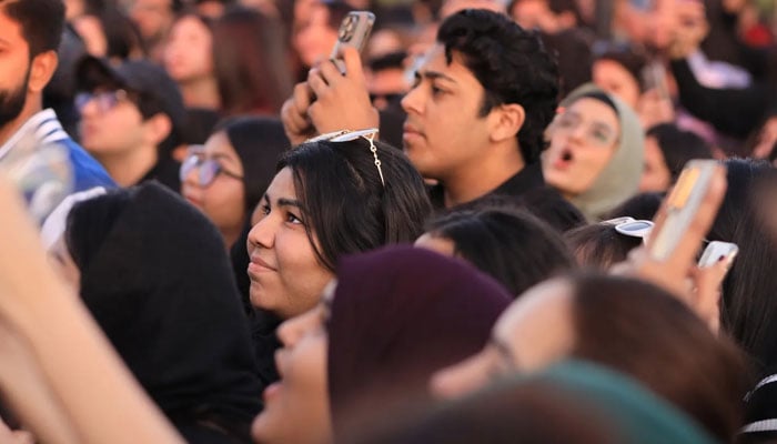 Revelers sing along with artists during a music session. — Facebook/Karachi Eat Festival