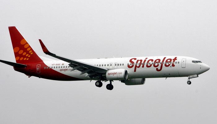 Indias SpiceJet aircraft prepares for landing at the airport in Mumbai July 15, 2008. — Reuters