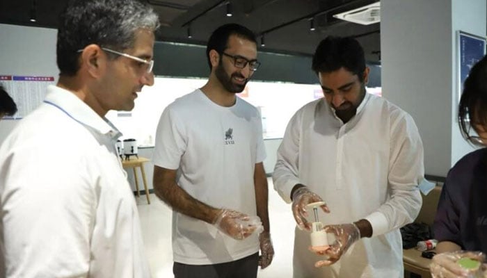 Dr Mohammed Yousaf unveils his revolutionary rechargeable battery at ZJU-Hangzhou Global Scientific and Technological Innovation Center in China. — APP