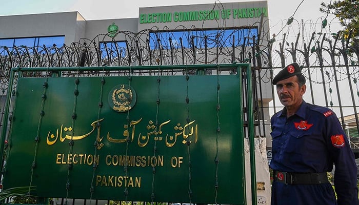 A security personnel stands guard at the headquarters of Election Commission of Pakistan in Islamabad on September 21, 2023. — AFP