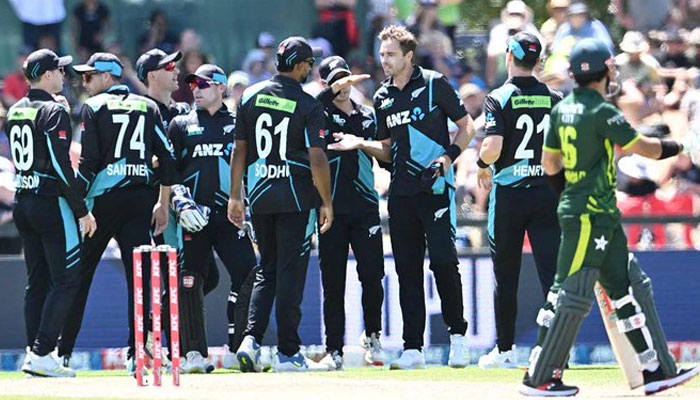 The image shows the players of the New Zealand team on the field in a match against Pakistan. — x/TOISports