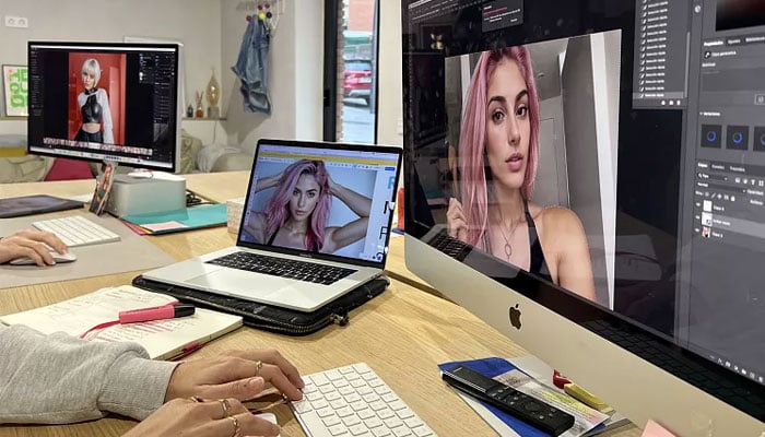 Designers working on Aitanas images at the agency. — Euronews via The Clueless Agency