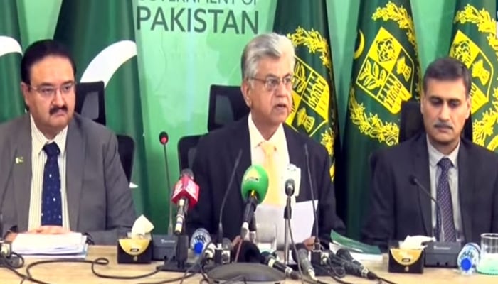 Caretaker Information Minister Murtaza Solangi (centre) is talking to media in Islamabad on January 22, 2024. —Radio Pakistan