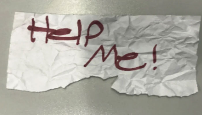 The note reading Help Me, was written by the abducted teen. — CNN via US Department of Justice