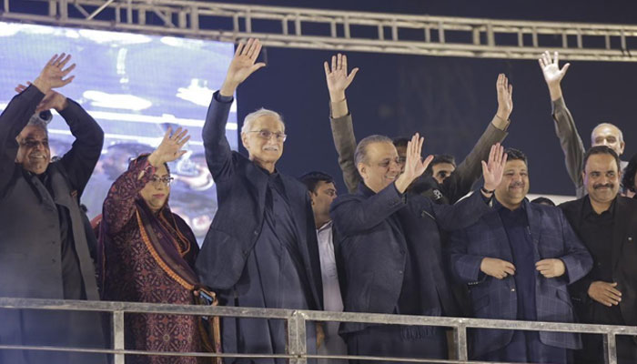 Istehkam-e-Pakistan Party (IPP) leaders Jahangir Khan Tareen (3rd left), Abdul Aleem Khan (4th left) and others pose for a group photo during the partys workers convention in Kamoke, Punjab on November 26, 2023. — Facebook/Istehkam-e-Pakistan Party