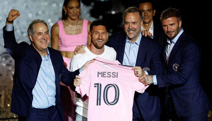 New Inter Miami signing Lionel Messi poses with a club shirt with owners Jorge Mas, Jose R. Mas and David Beckham during the unveiling.— Reuters/File