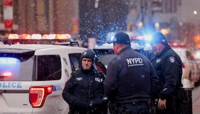 Members of the New York City Police Department gather at the entrance of the Museum of Modern Art (MOMA) after an alleged multiple stabbing incident, in New York. — Reuters/File