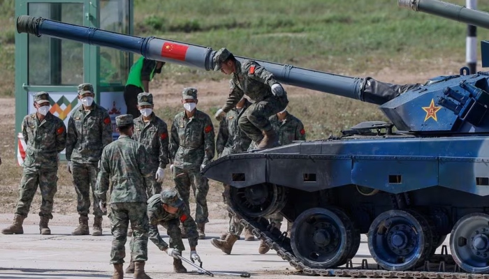 Members of Chinas team operate with their Type 96A tank during the Tank Biathlon competition at the International Army Games 2022 in Alabino, outside Moscow, Russia on August 16, 2022. —Reuters