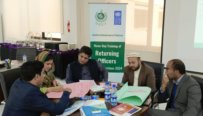 Officials appointed as returning officers attend ECPs training workshop for upcoming polls. — X/@UNDP_Pakistan