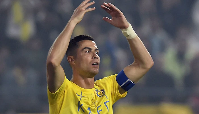 Ronaldos Al Nassr takes regular bus in China following tour postponement.—Reuters/file