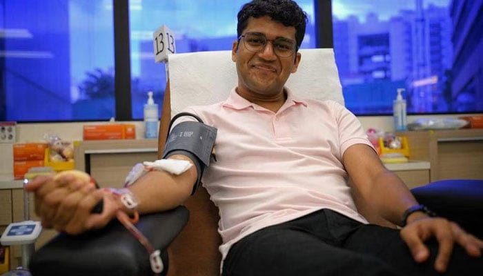 NUS undergraduate Shiek Abdullah Mohamed Fazil has donated blood 13 times since 2019. — ST PHOTO: MARK CHEONG