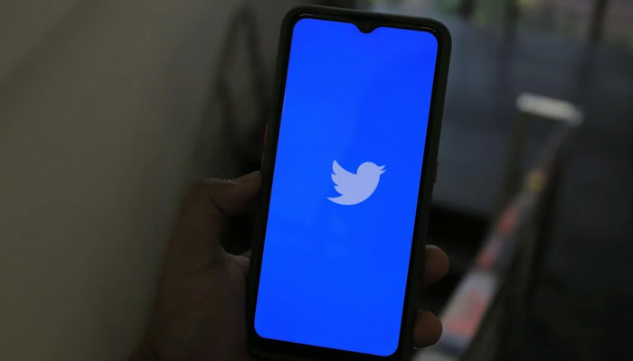 A representational image of Twitter (now X) application being used on a smartphone. — Pexels