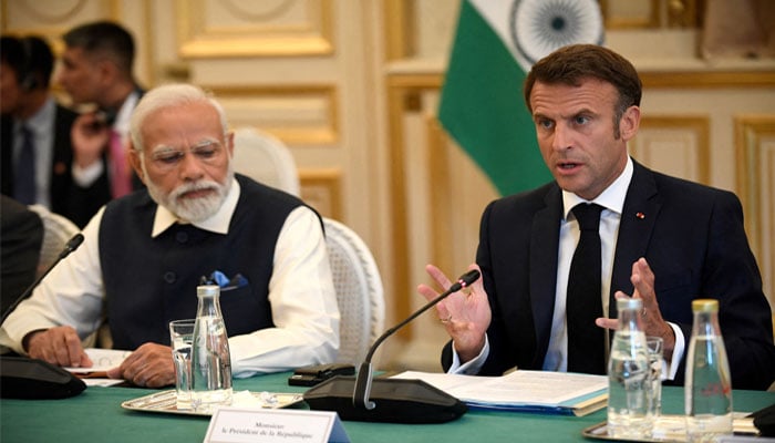Frances President Emmanuel Macron speaks as Indias Prime Minister Narendra Modi listens during a meeting at The Ministry of Foreign Affairs in Paris, France on July 14, 2023. — Reuters