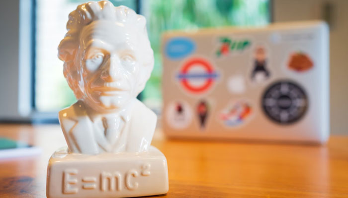 An Albert Einstein figurine placed on a table. — Unsplash