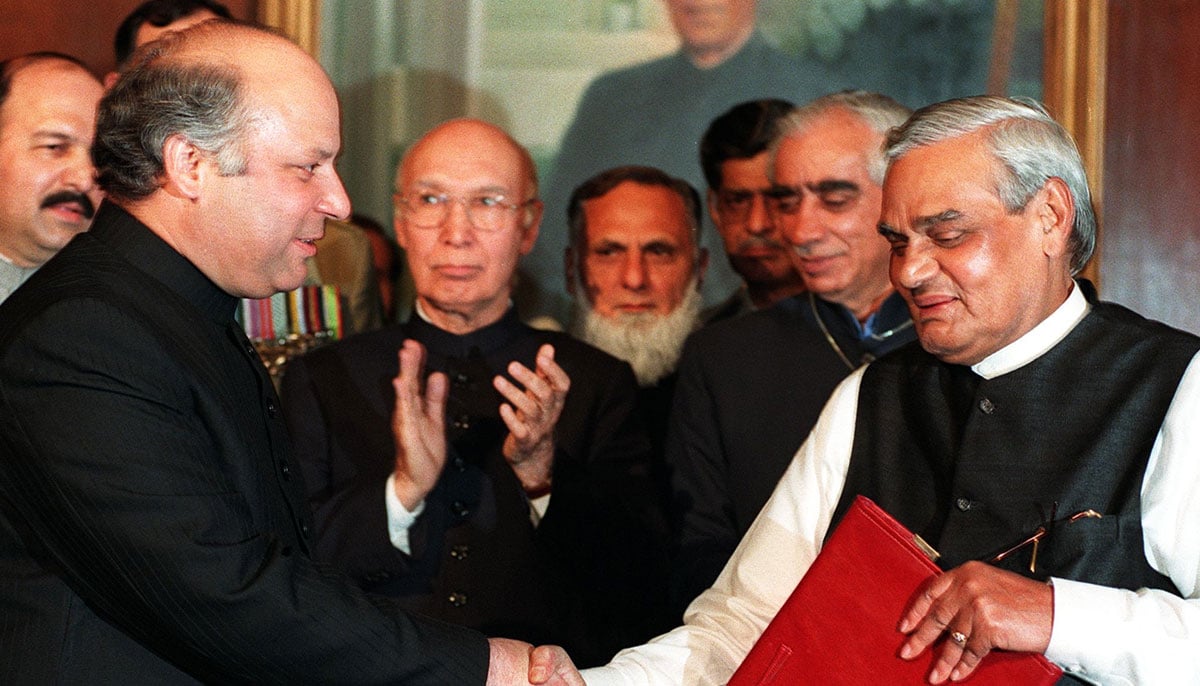 Nawaz Sharif (left) shakes hands with Indian Prime Minister Attal Bihari Vajpai during his visit to Pakistan in 1999.—Agencies