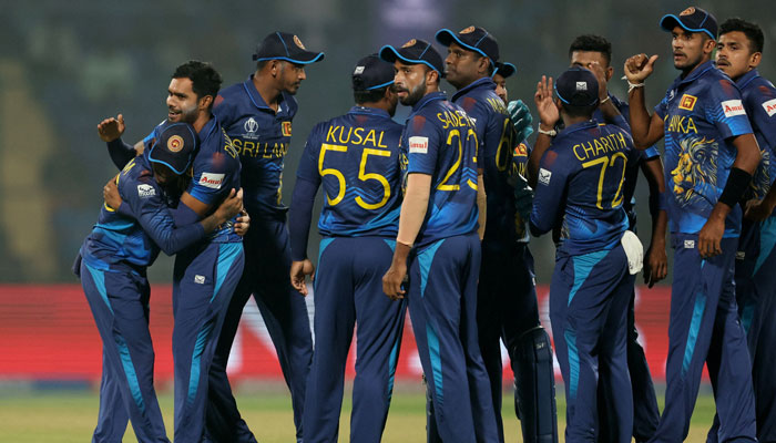Sri Lankas Dilshan Madushanka celebrates with teammates after taking the wicket of Bangladeshs Tanzid Hasan, caught out by Pathum Nissanka on November 6, 2023. — Reuters