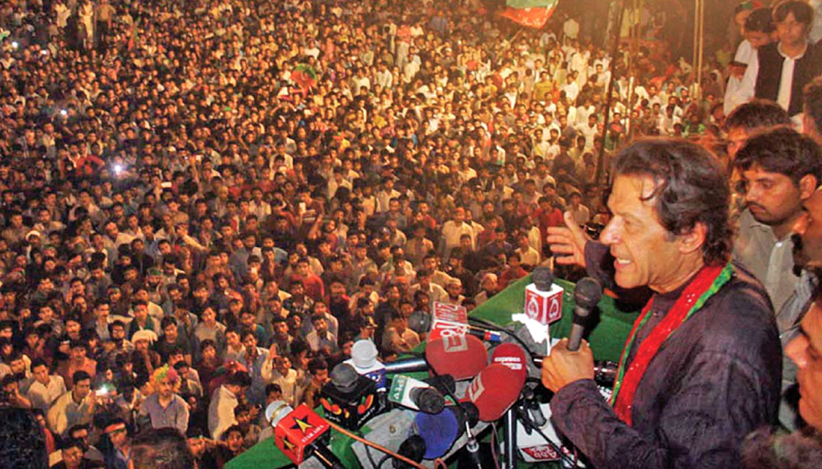 PTI chairman Imran Khan addresses a gathering in Faisalabad. — Agencies