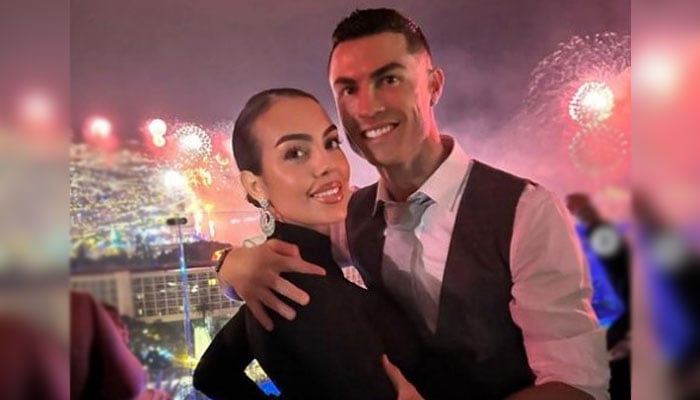 Al Nassrs Cristiano Ronaldo poses with long-time partner Georgina Rodriguez during New Year 2024 celebrations. — Instagram/@georginagio