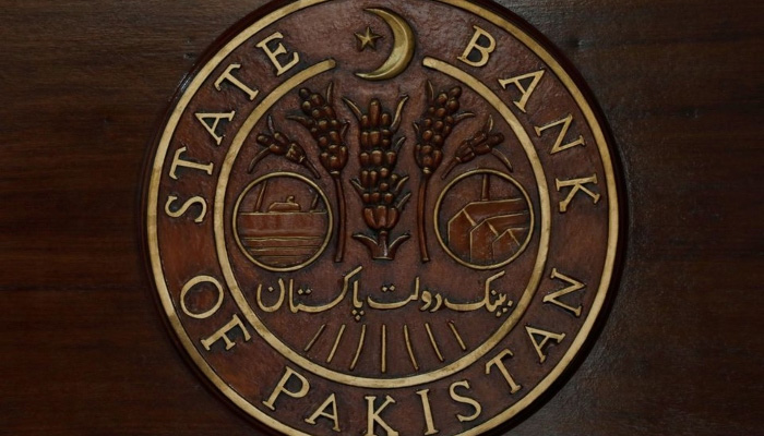 The logo of the State Bank of Pakistan (SBP) is pictured on a reception desk. — Reuters/File