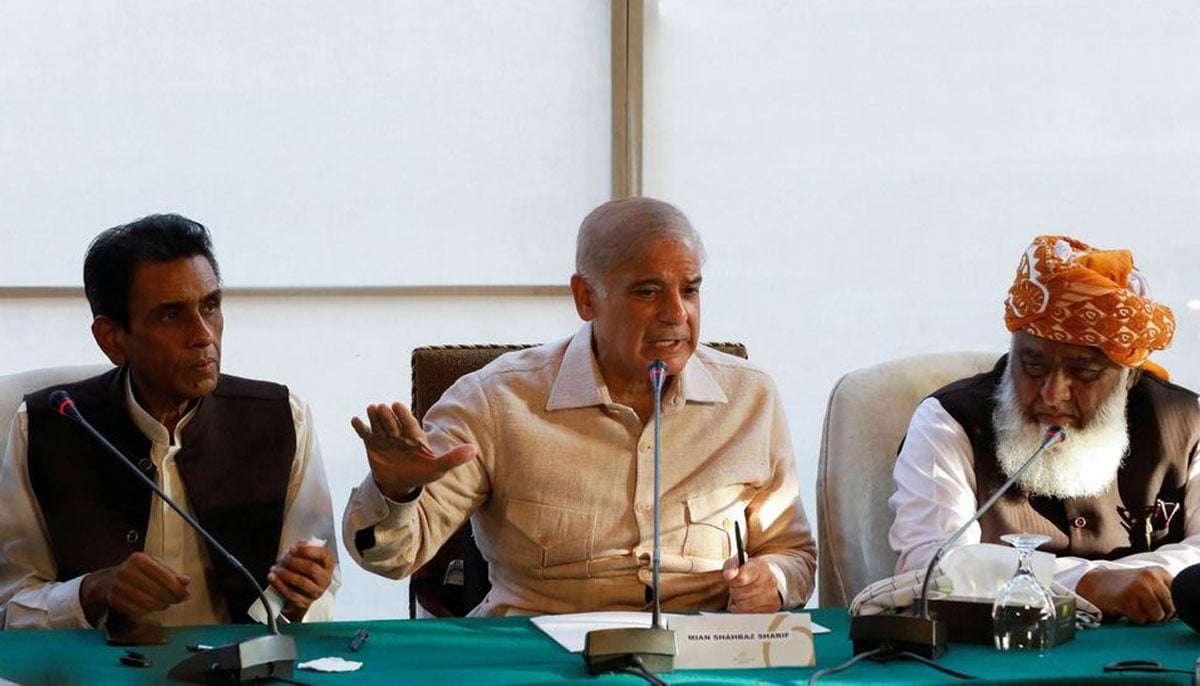 Mian Muhammad Shehbaz Sharif, brother of ex-prime minister Nawaz Sharif, along with Khalid Maqbool Siddiqui, leader of the Muttahida Qaumi Movement (MQM) political party, and Fazal-ur Rehman, president of the Jamiat Ulema-e-Islam-Fazal (JUI-F), during a joint press conference in Islamabad, Pakistan March 30, 2022. —Reuters