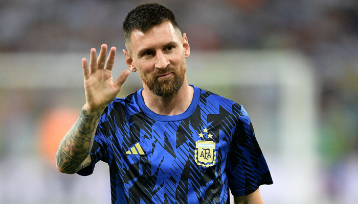 Argentinas forward Lionel Messi waves as he warms up during the 2026 FIFA World Cup South American qualification football match between Brazil and Argentina at Maracana Stadium in Rio de Janeiro, Brazil, on November 21, 2023. — AFP