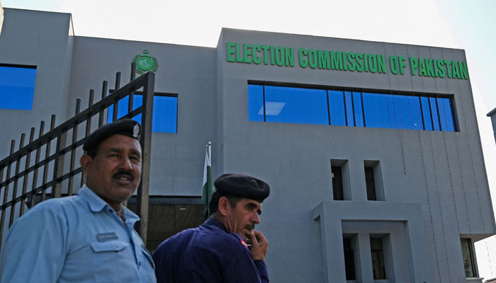 Security personnel stand guard at the headquarters of the Election Commission of Pakistan in Islamabad on September 21, 2023. — AFP