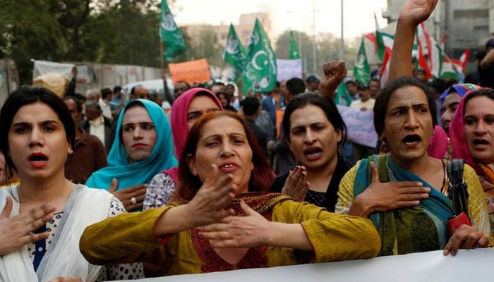 A group of transgender people beat their chests and chant slogans to condemn the rape and killing of 7-year-old girl Zainab Ansari in Kasur, during a protest in Karachi, January 13, 2018. — Reuters