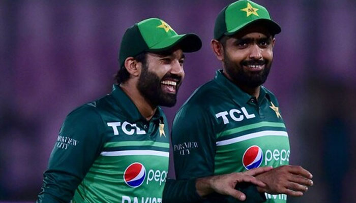 Pakistan wicketkeeper-batter Mohammad Rizwan (left) and former skipper Babar Azam. — AFP