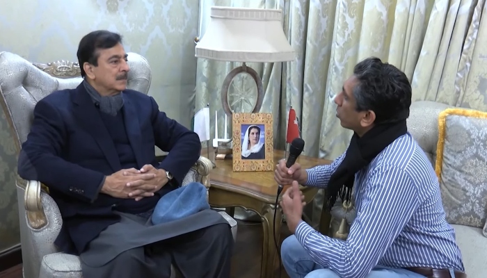 Ex-Pakistani Prime Minister Yusuf Raza Gilani (L) speaks in an interview with Geo News correspondent Azad Syed in Multan on February 1, 2024. — YouTube/Talk Shock