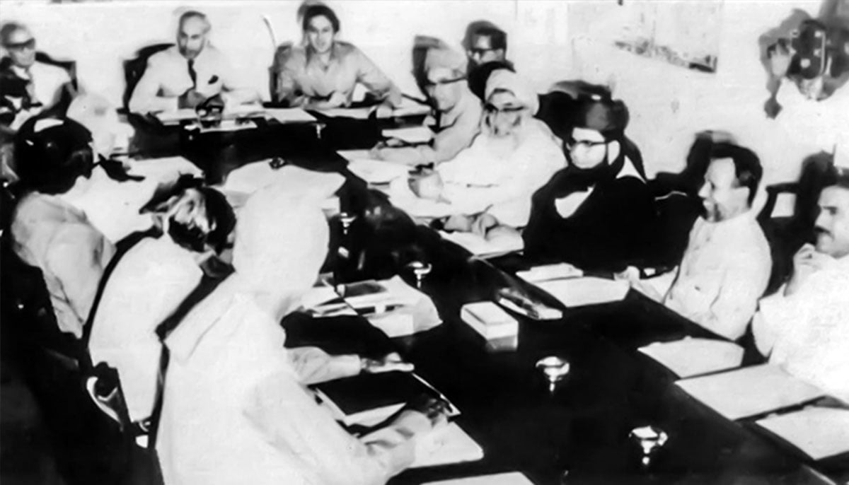 Bhutto holding talks with members of the right-wing opposition alliance, the Pakistan National Alliance (PNA) in this undated photo.—Agencies