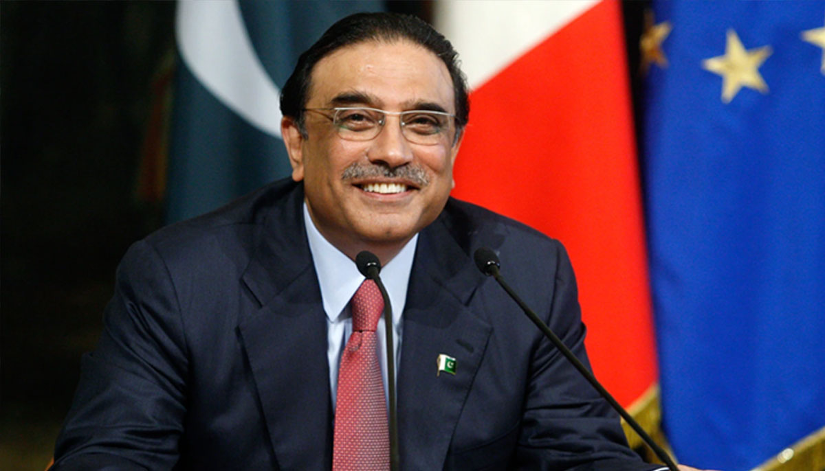 Asif Ali Zardari smiles during a press conference in this undated photo. —Reuters
