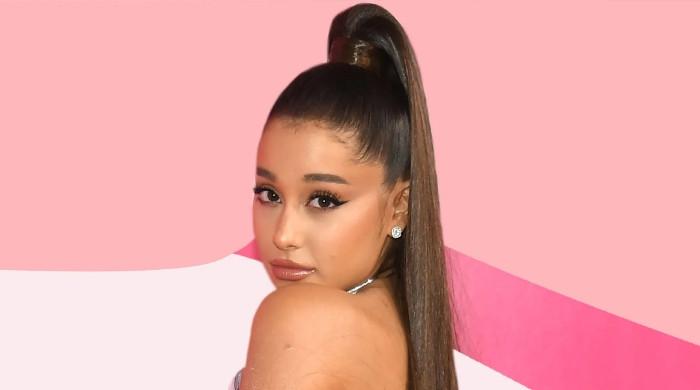 Ariana Grande wells up as she updates fans about her upcoming project
