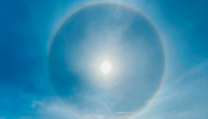 A halo around the sun. — Unsplash