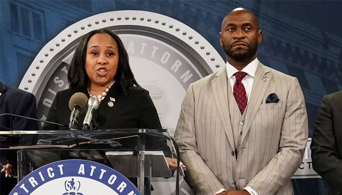 Fulton County District Attorney Fani Willis speaks at a press conference next to prosecutor Nathan Wade after a Grand Jury brought back indictments against former president Donald Trump and his allies in their attempt to overturn the states 2020 election results, in Atlanta, Georgia, US August 14, 2023. — Reuters