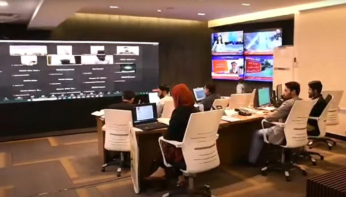 In this still taken from a video, ECP officers can be seen overseeing the operations of the Election Monitoring Control Centre. — YouTube/@ElectionCommissionofPakistan