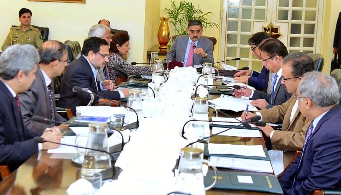 Caretaker Prime Minister Anwaar-ul-Haq Kakar chairs a meeting regarding the Pakistan International Airlines in Islamabad on October 23, 2023. —APP