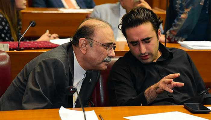 Former president Asif Zardari and PPP Chairman Bilawal Bhutto having a discussion during a National Assembly session. — APP/File