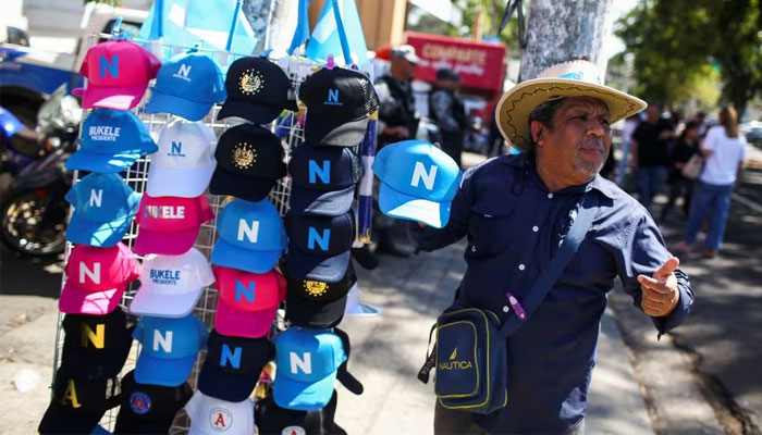 A person sells merchandise of El Salvadors President Nayib Bukele of the Nuevas Ideas party, who is running for reelection, on the day of the presidential election in San Salvador, El Salvador, February 4, 2024. — Reuters