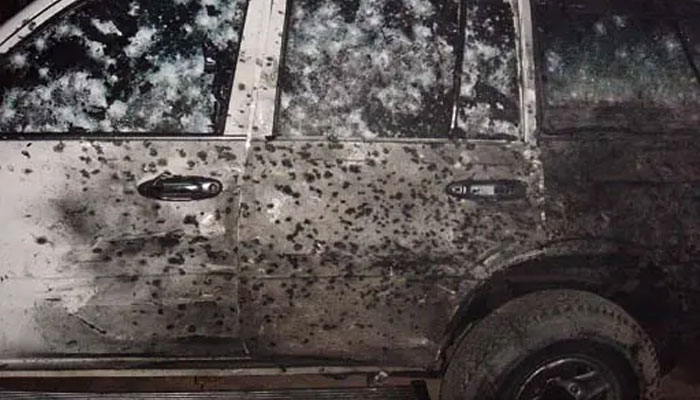 Photo shows Benazir Bhuttos bomb-wrecked car with its left side riddled with shrapnel marks shortly after the terrorist attack that killed her on December 27, 2008.—AFP