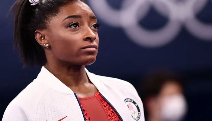 U.S. gymnast Simone Biles watches the artistic gymnastics womens team final during the Tokyo Olympics at the Ariake Gymnastics Centre on Sunday. — AFP